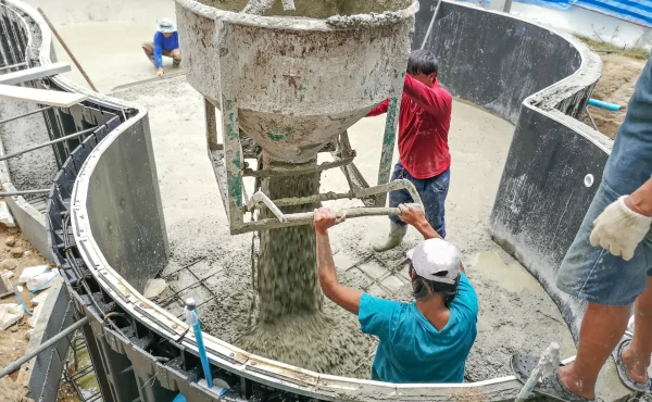 Swimming pool construction. Workers were pouring concrete work.construction work.